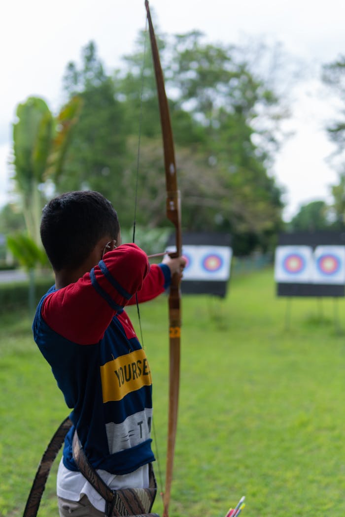 A Boy is Playing Target Archery